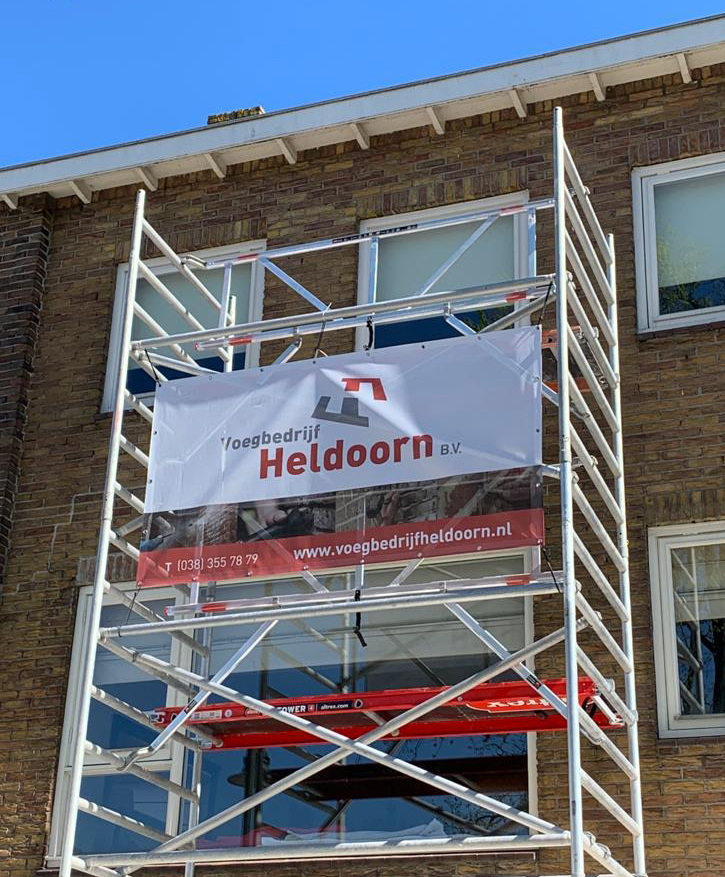 Nieuwe spandoeken voor Voegbedrijf Heldoorn, ontworpen door burowit in Kampen